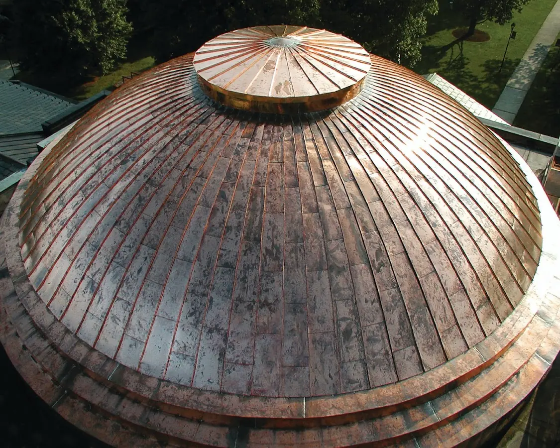 Craftsman Roofing crew installing a new roof in Vergennes